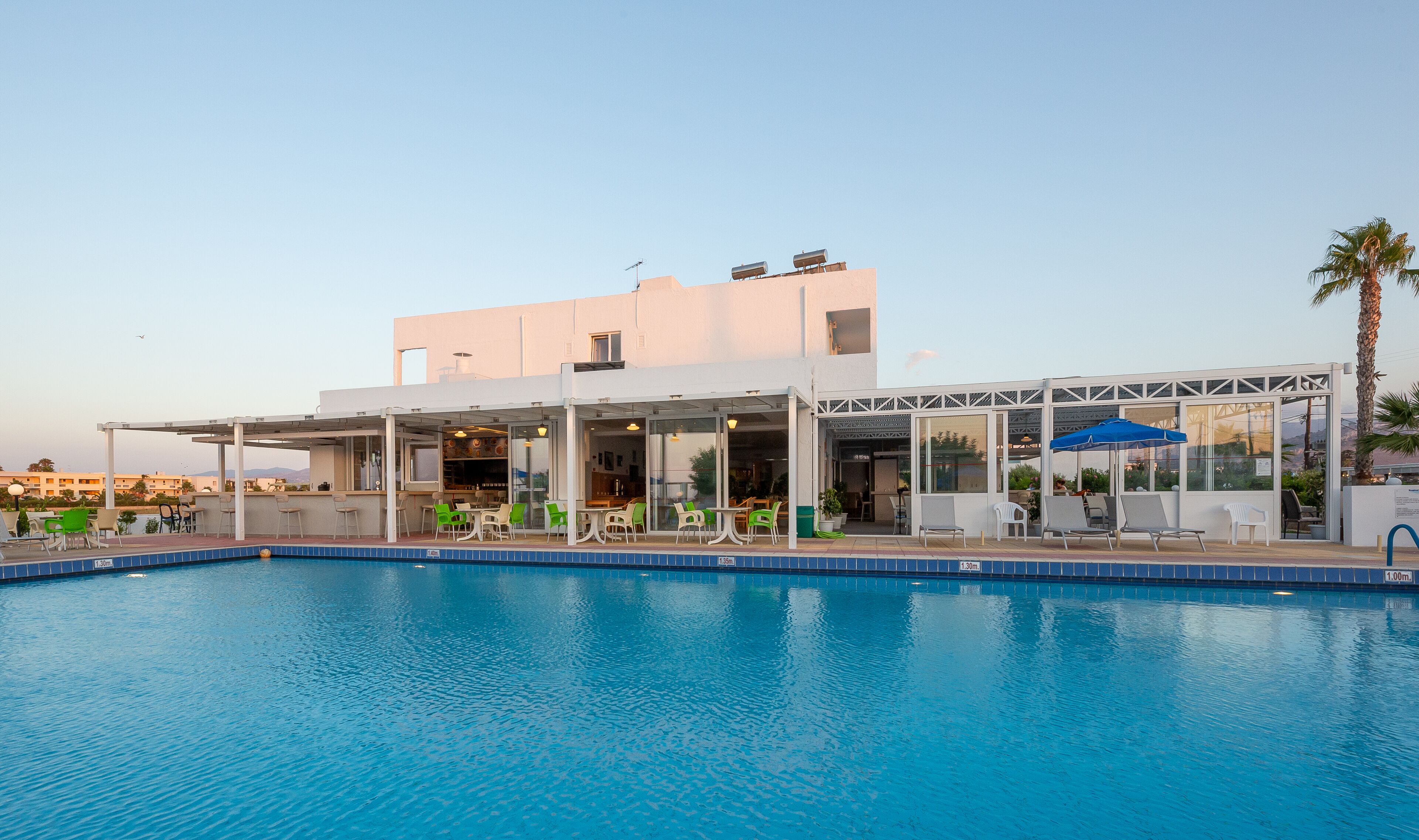 Outdoor pool, pool umbrellas, pool loungers
