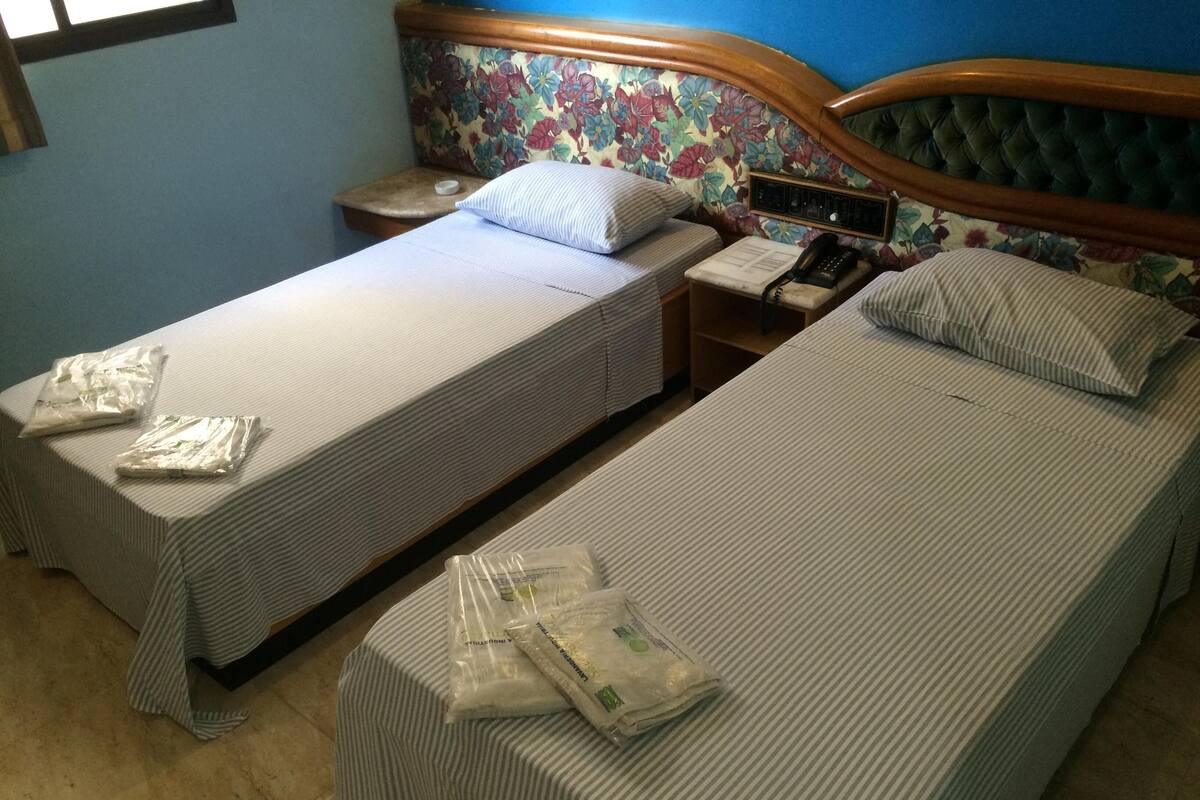Desk, blackout drapes, WiFi (free), bed sheets