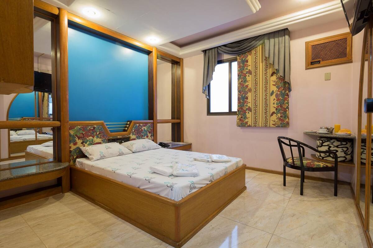 Desk, blackout drapes, WiFi (free), bed sheets