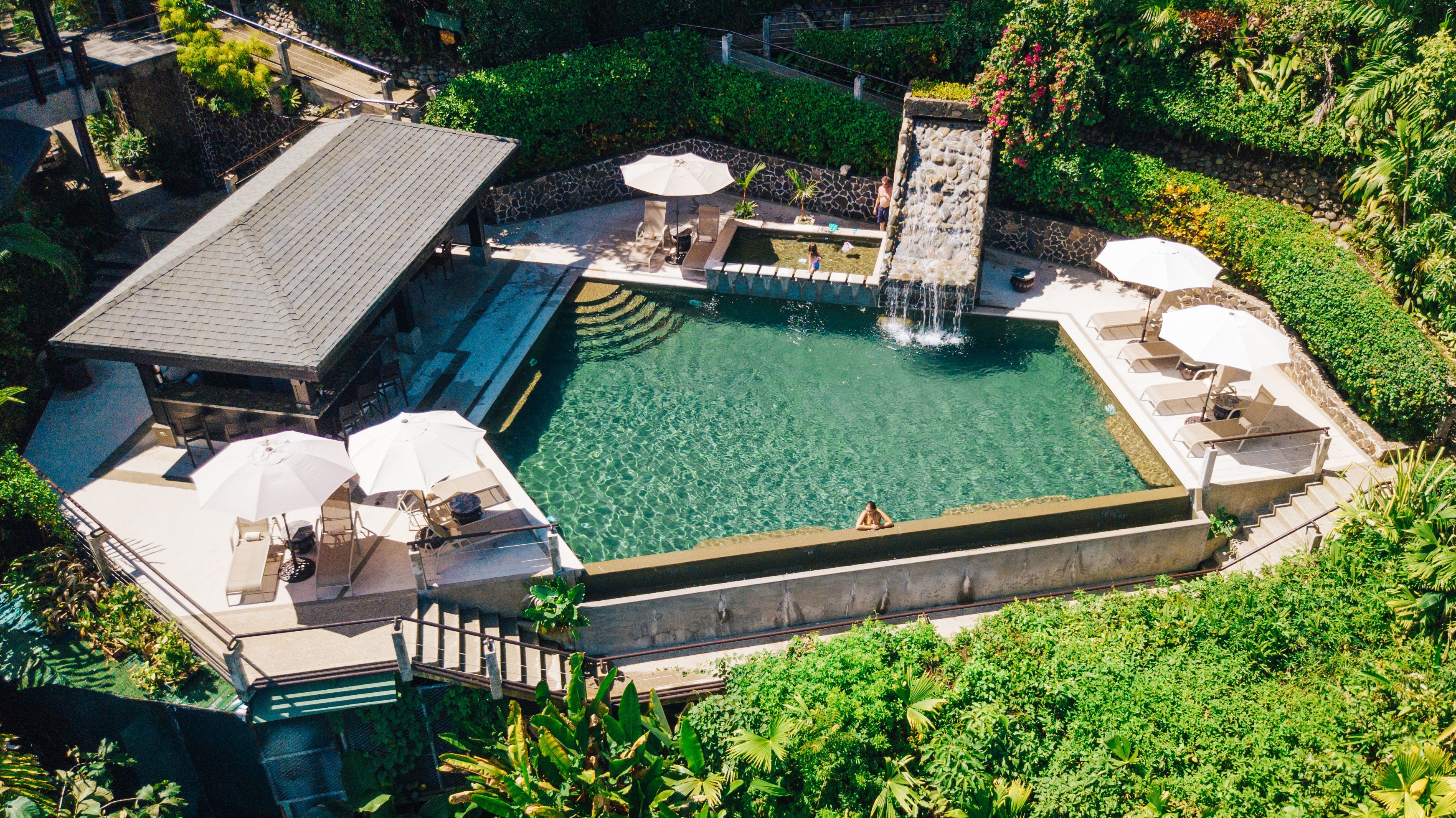4 outdoor pools, pool umbrellas, pool loungers