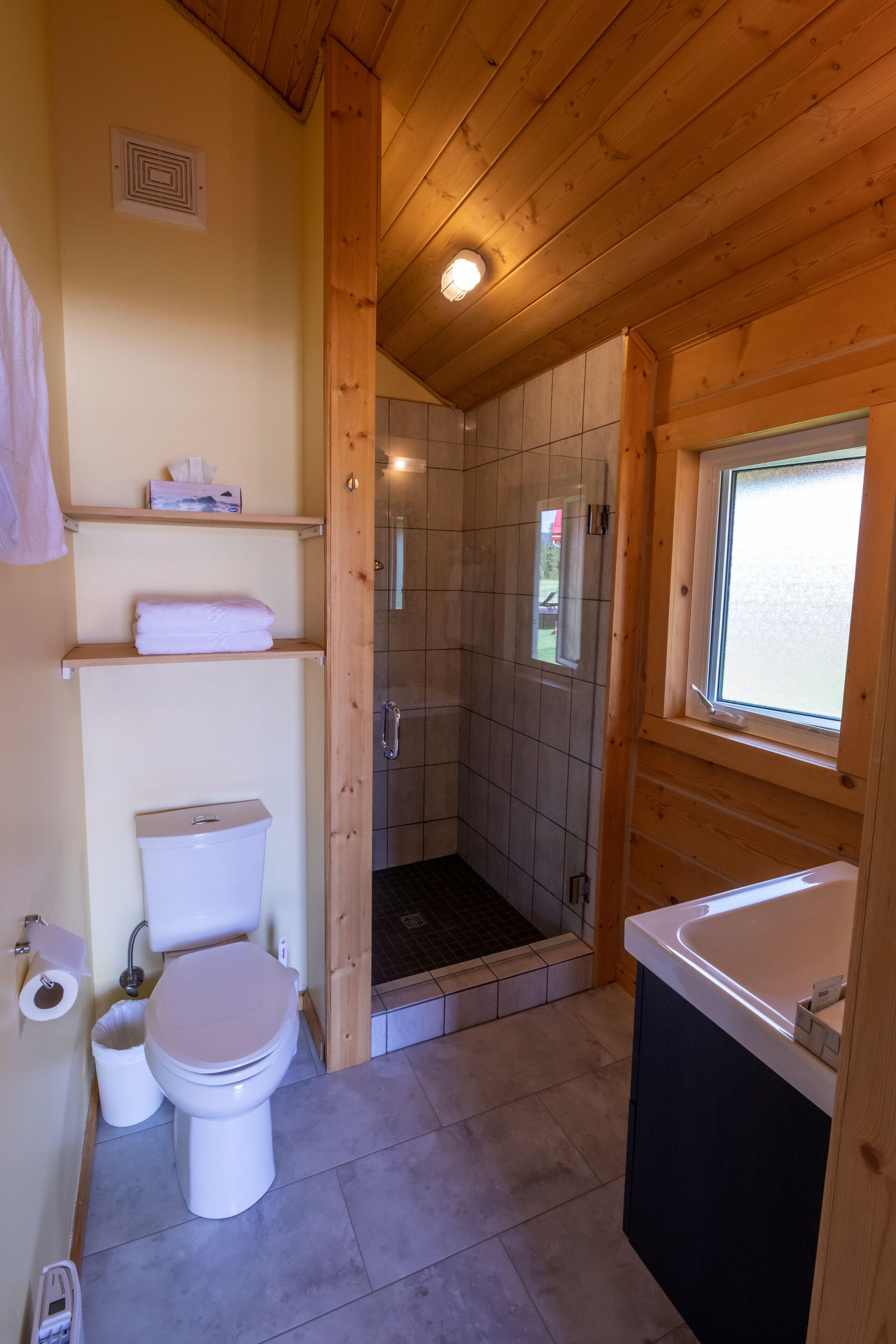 premium cabin, 1 bedroom, ensuite, garden area | bathroom | shower, free toiletries, hair dryer, slippers