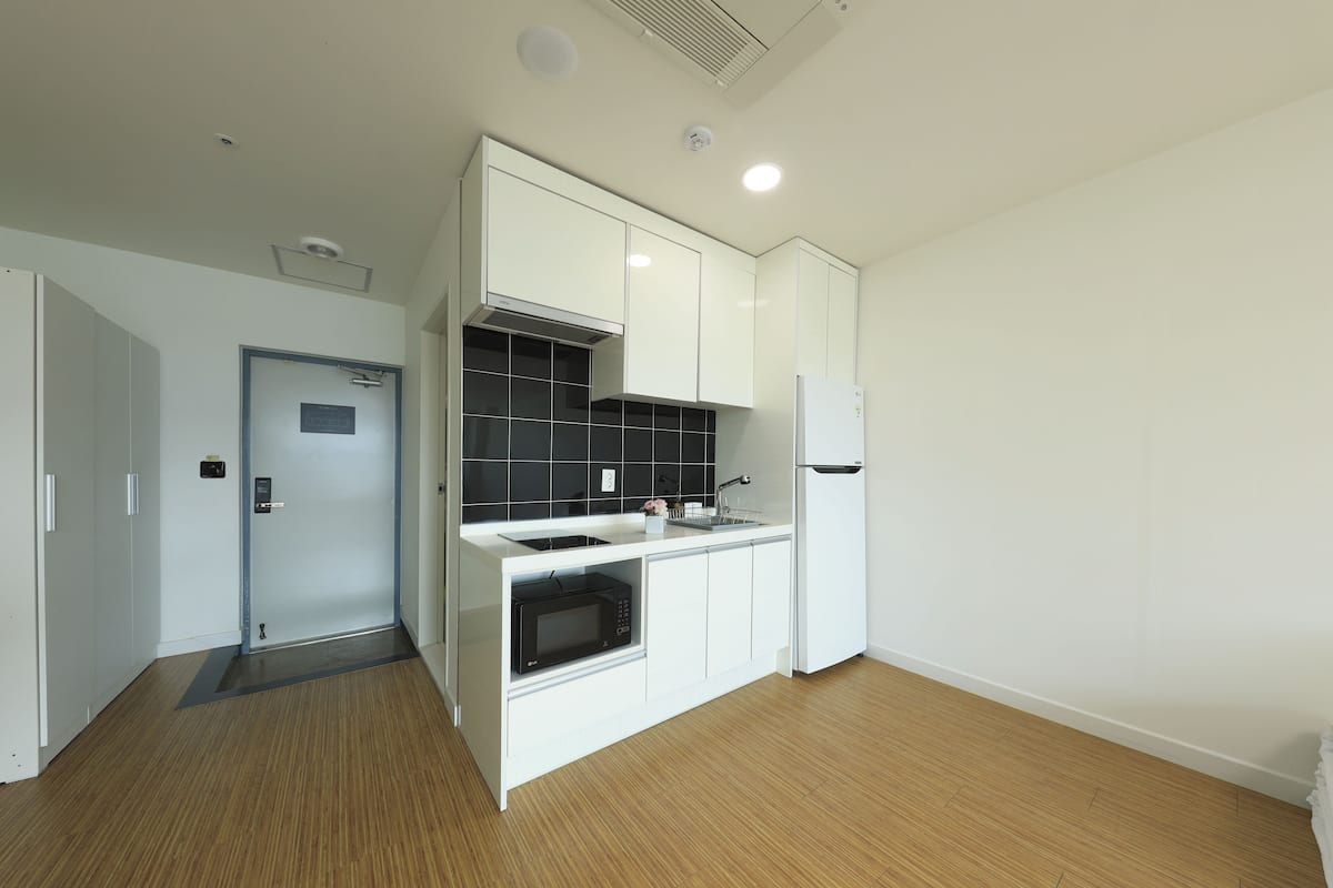 traditional room (main building) | private kitchen | fridge, microwave, rice cooker, cookware/dishes/utensils