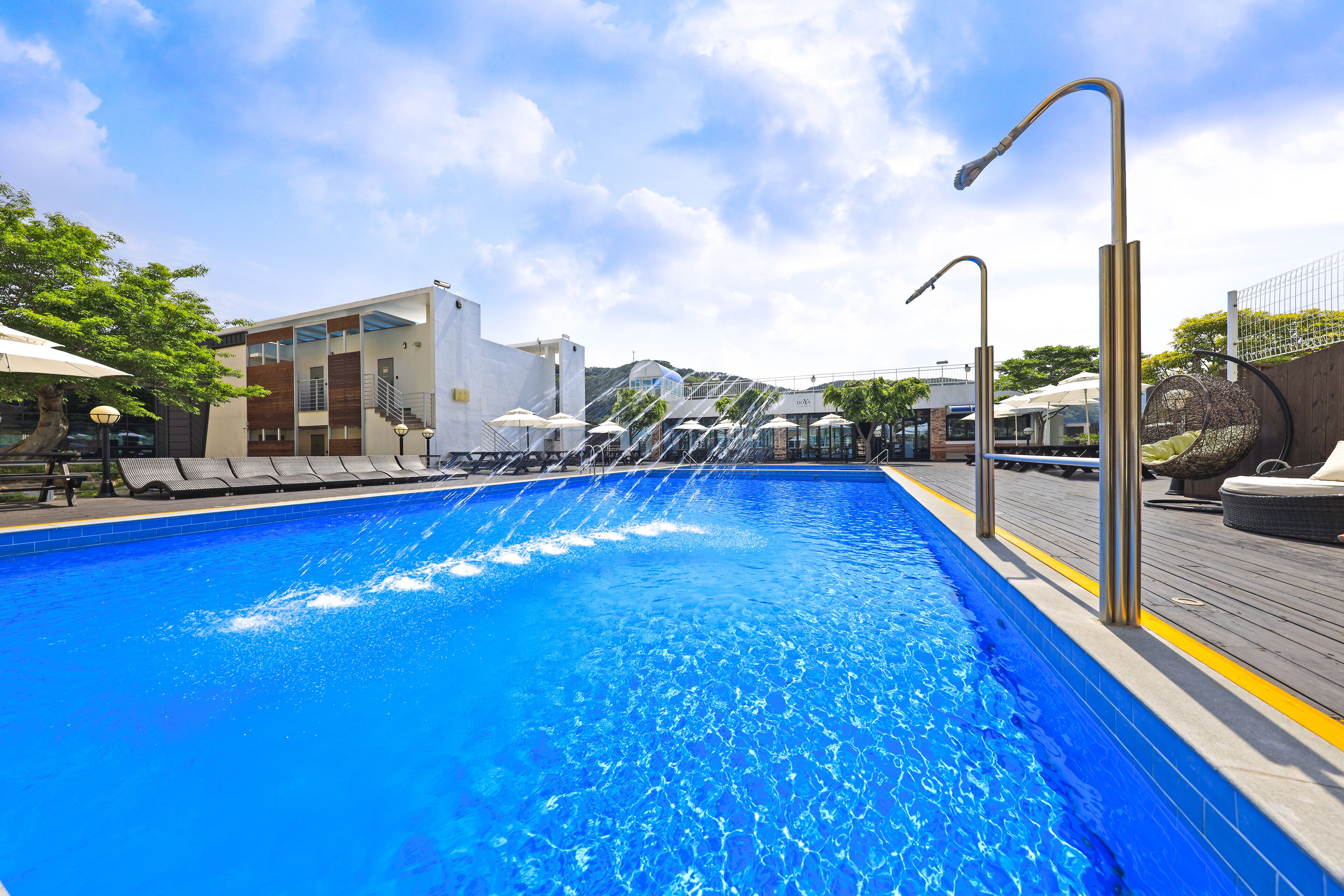 seasonal outdoor pool, open 6:00 am to 9:00 pm, pool umbrellas