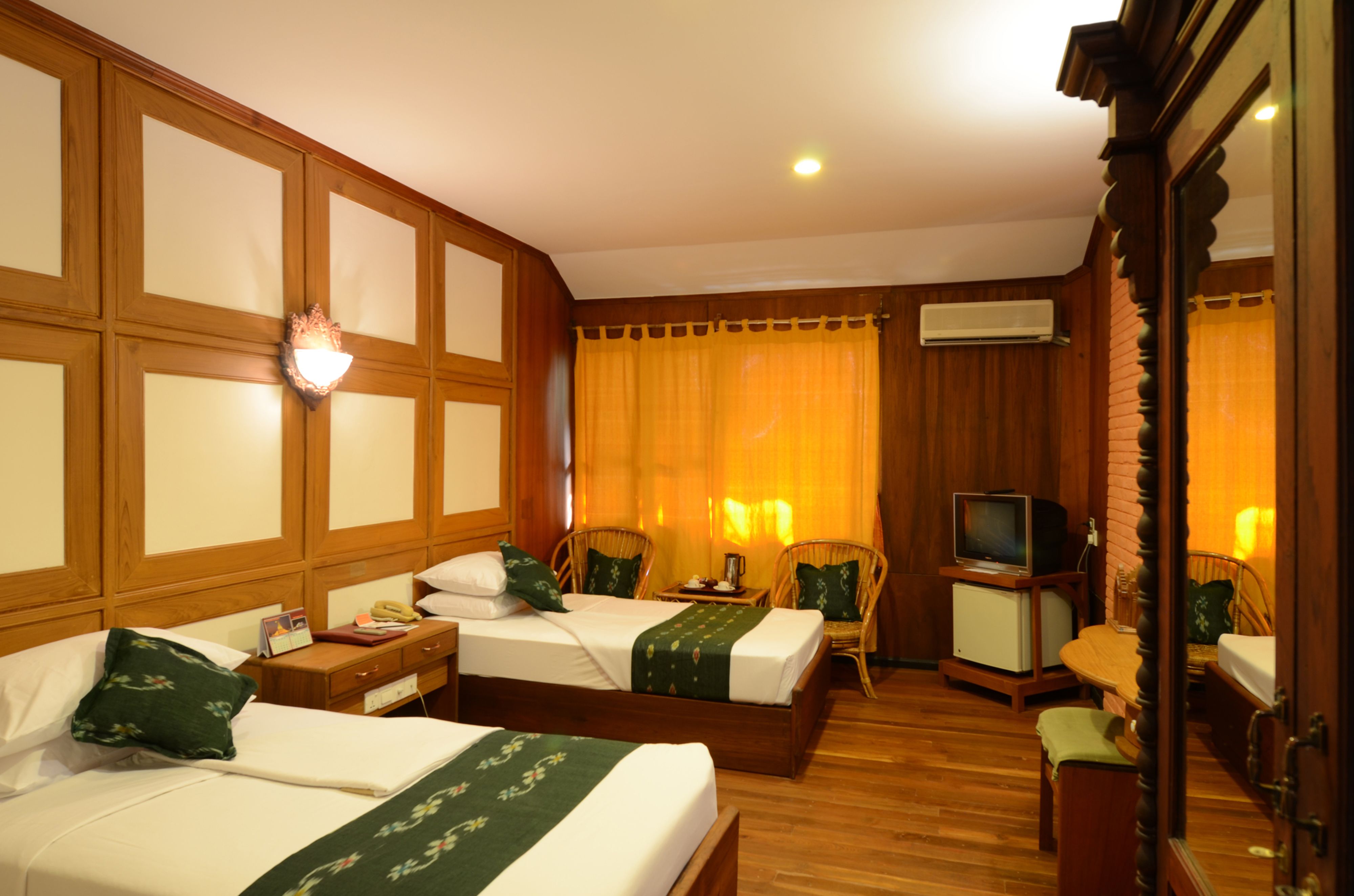 deluxe room | minibar, in-room safe, desk, blackout curtains