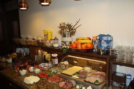 Daily buffet breakfast for a fee. Pension Sartor