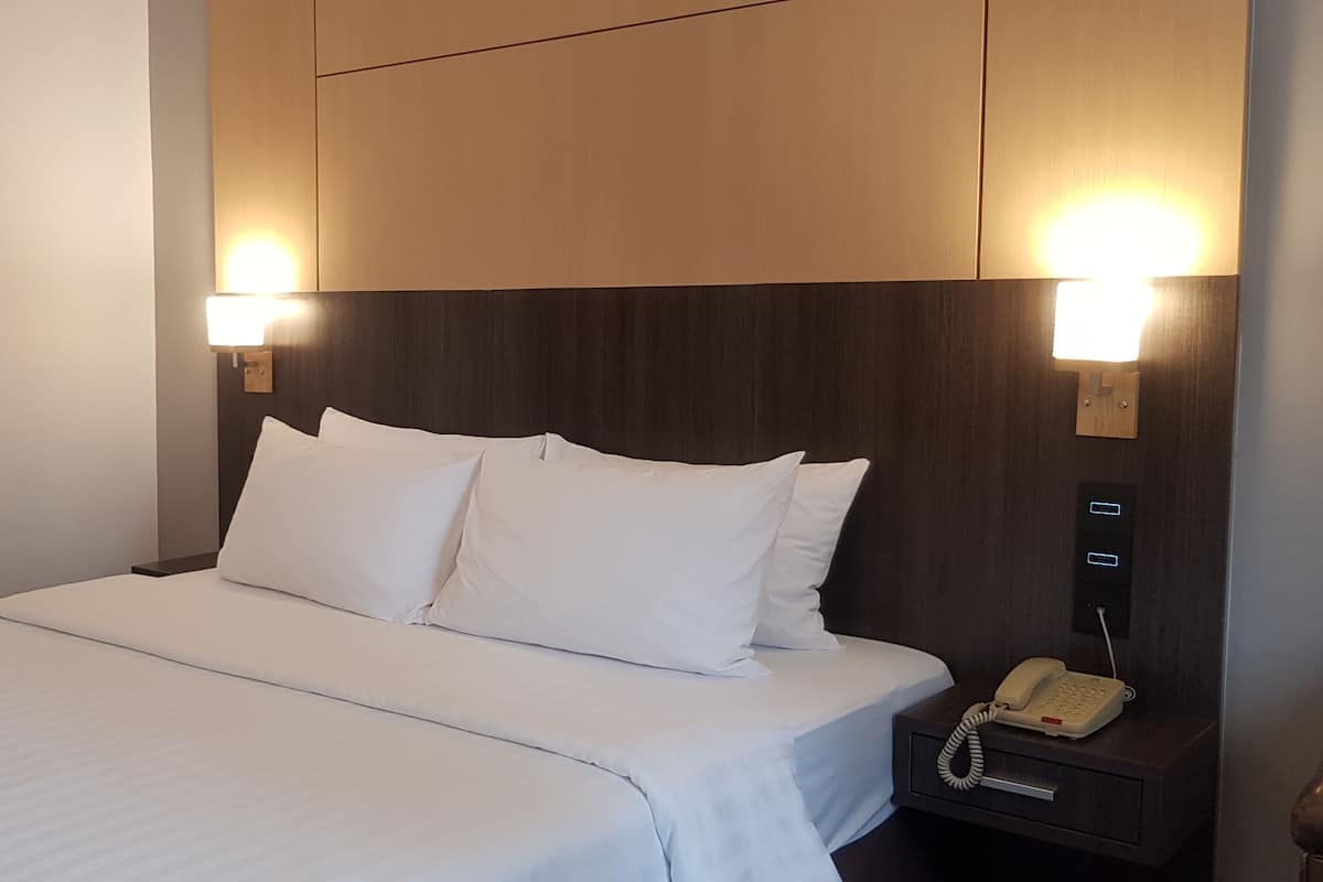Habitación individual superior | 1 habitación, ropa de cama de alta calidad y minibar