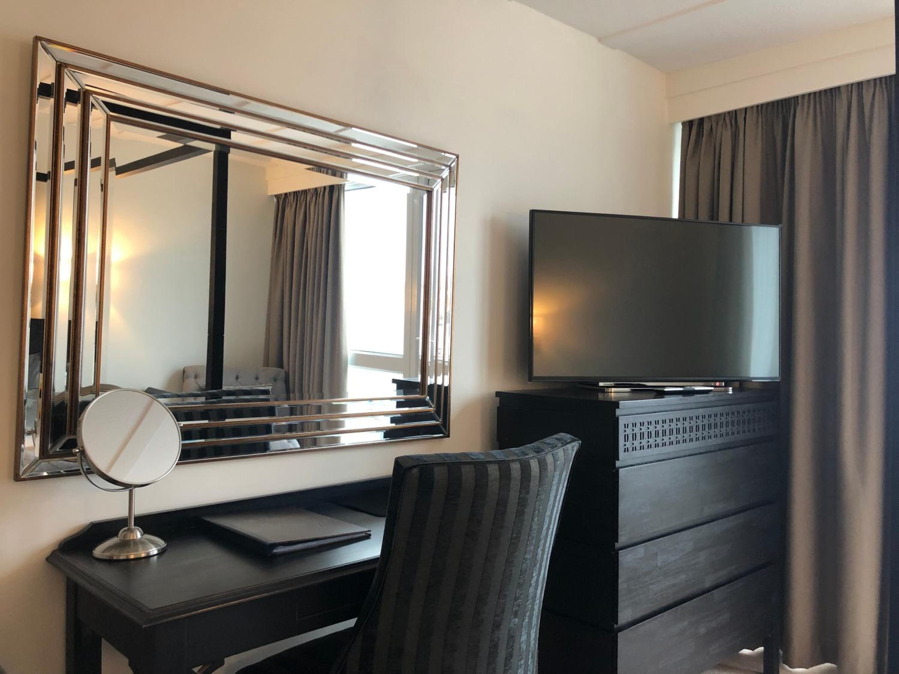 individually decorated, individually furnished, desk, blackout curtains