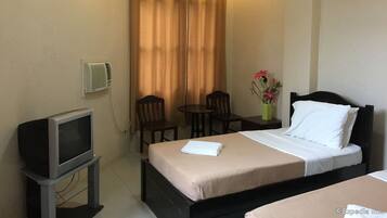 Standard Twin Room | Desk, blackout curtains, iron/ironing board, rollaway beds