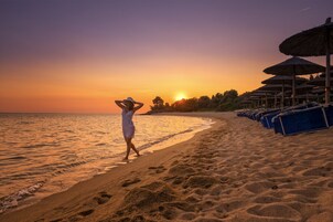 Sun loungers, beach umbrellas, beach towels, scuba diving