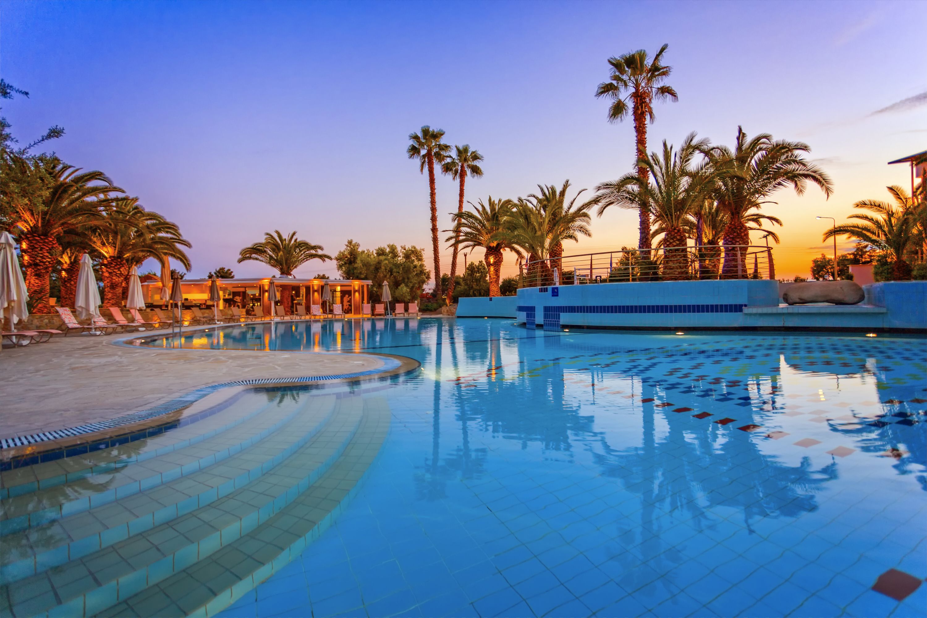 Outdoor pool, open 10 AM to 7 PM, pool umbrellas, sun loungers