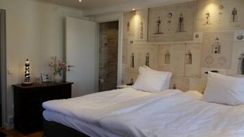 Premium bedding, individually furnished, blackout curtains