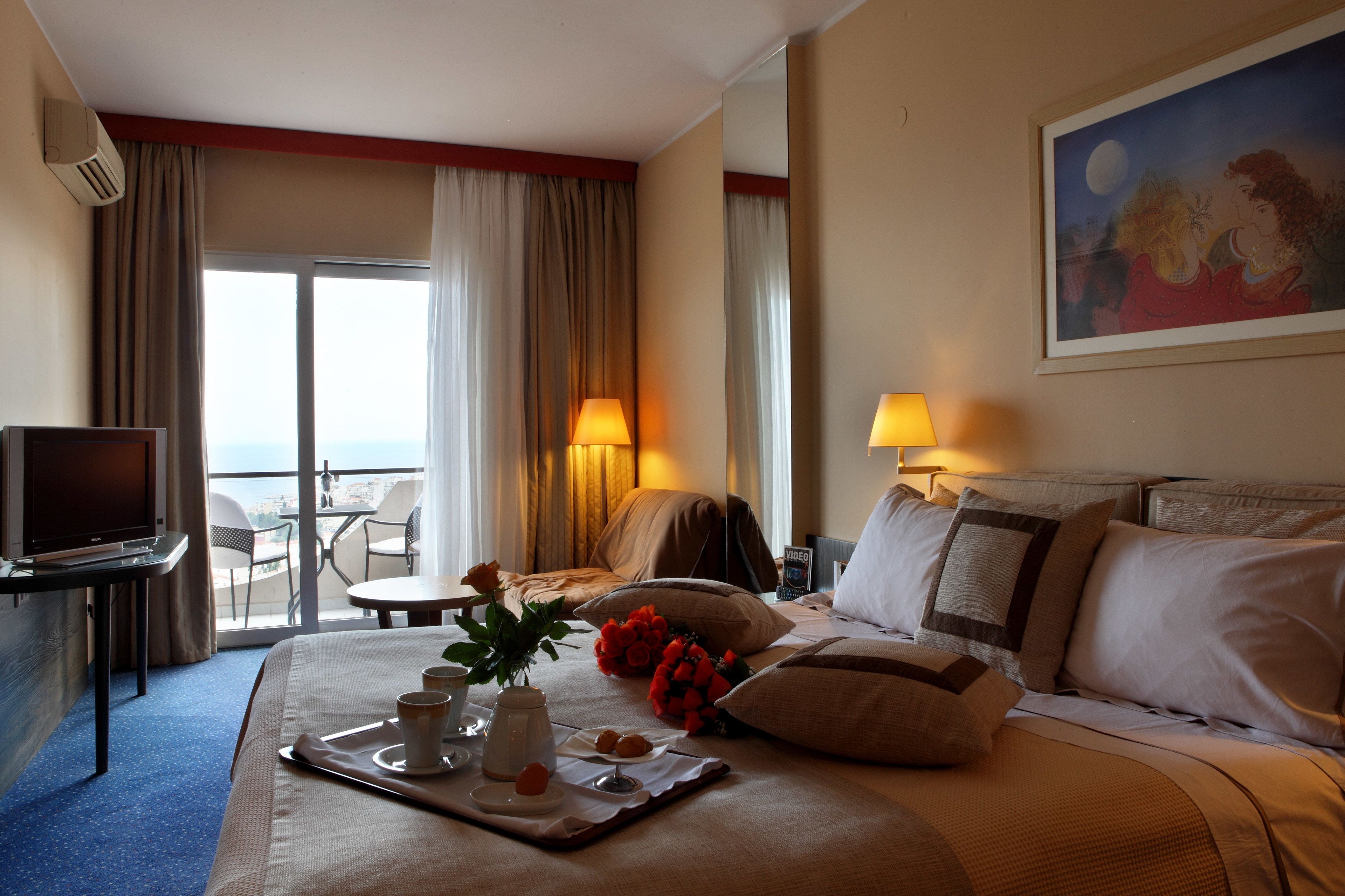 Classic Double or Twin Room, Sea View | Minibar, in-room safe, desk, blackout curtains
