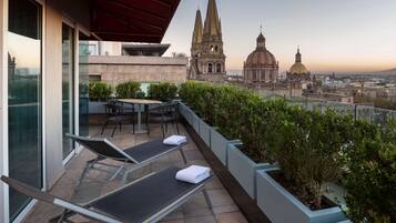 Premium bedding, down duvets, pillow-top beds, free minibar items