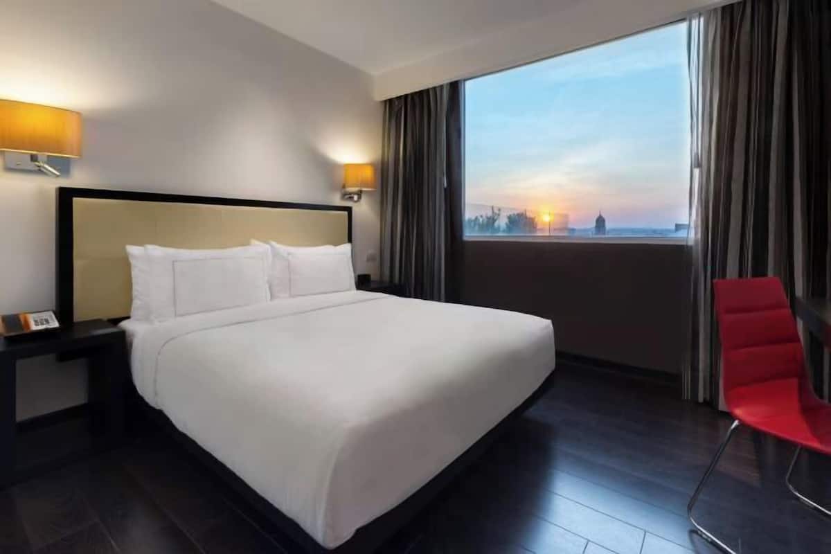 Premium bedding, down duvets, pillow-top beds, free minibar items