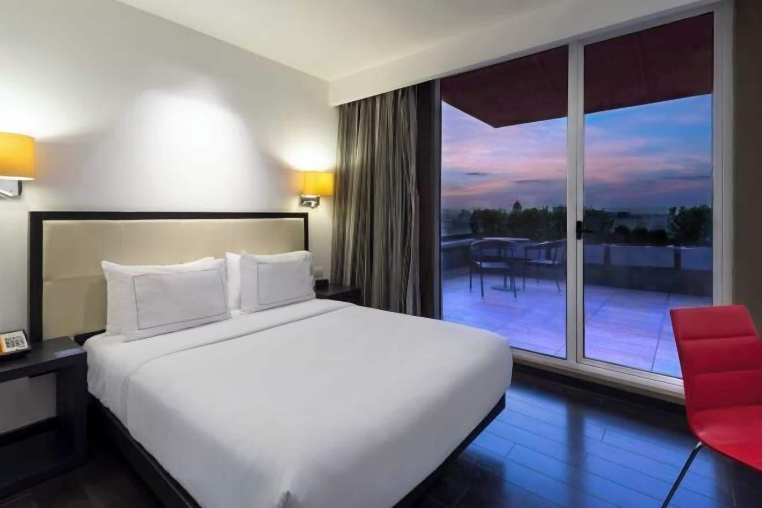 Premium bedding, down comforters, pillowtop beds, minibar