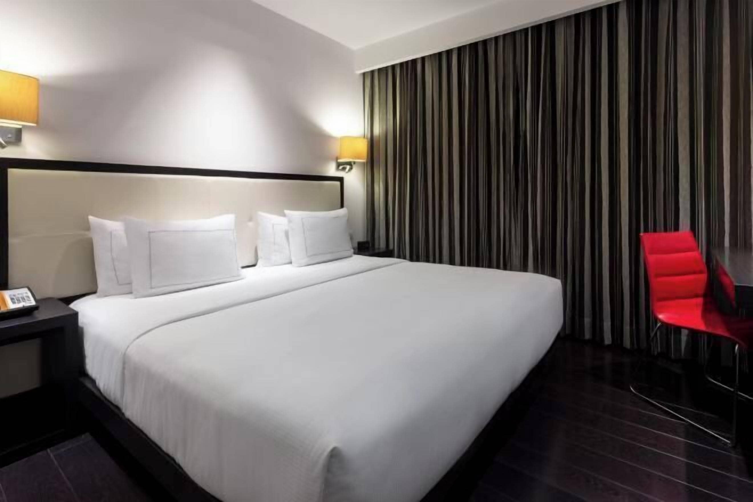 Premium bedding, down comforters, pillowtop beds, minibar