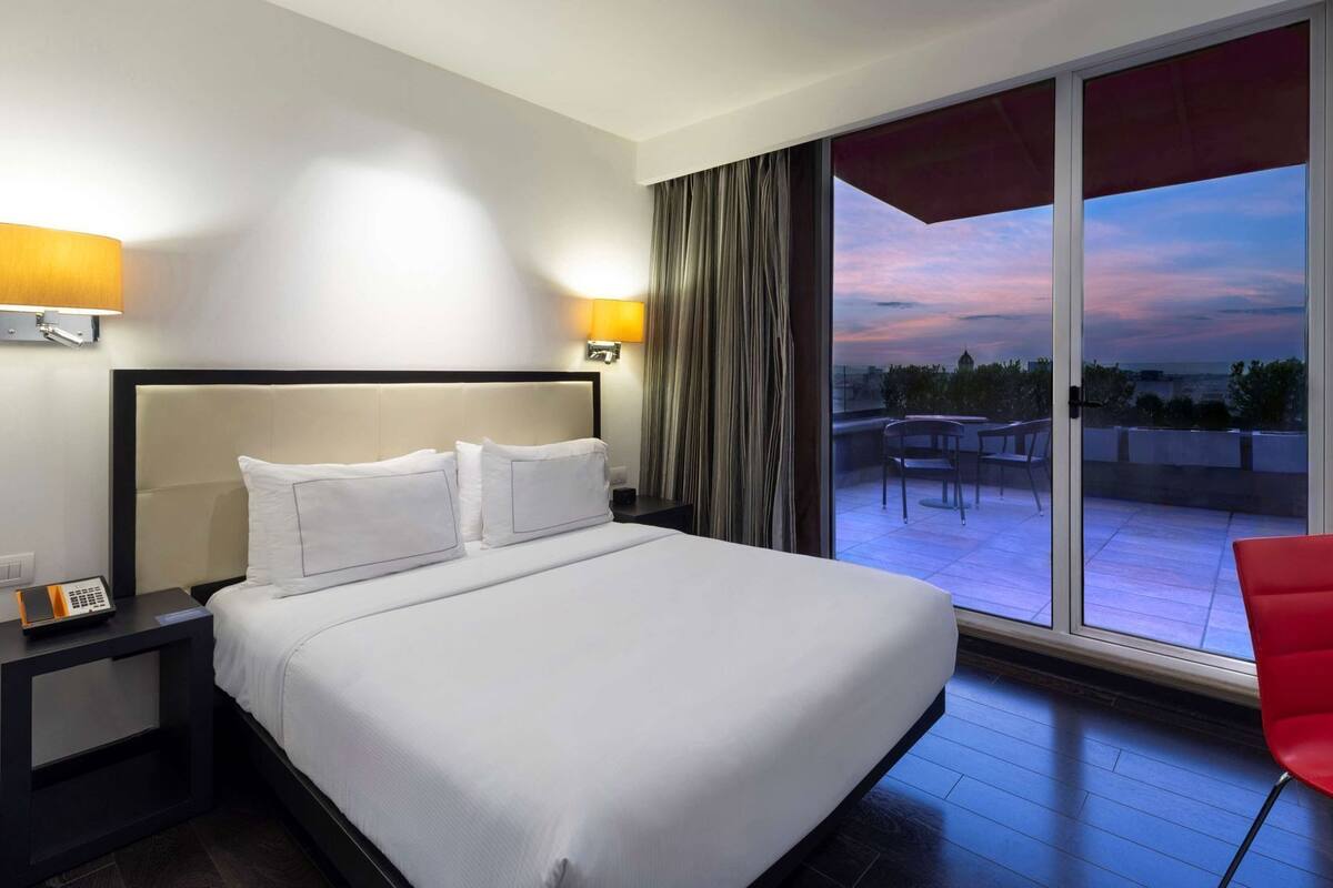 Ropa de cama de alta calidad, edredón, camas con pillow-top y minibar