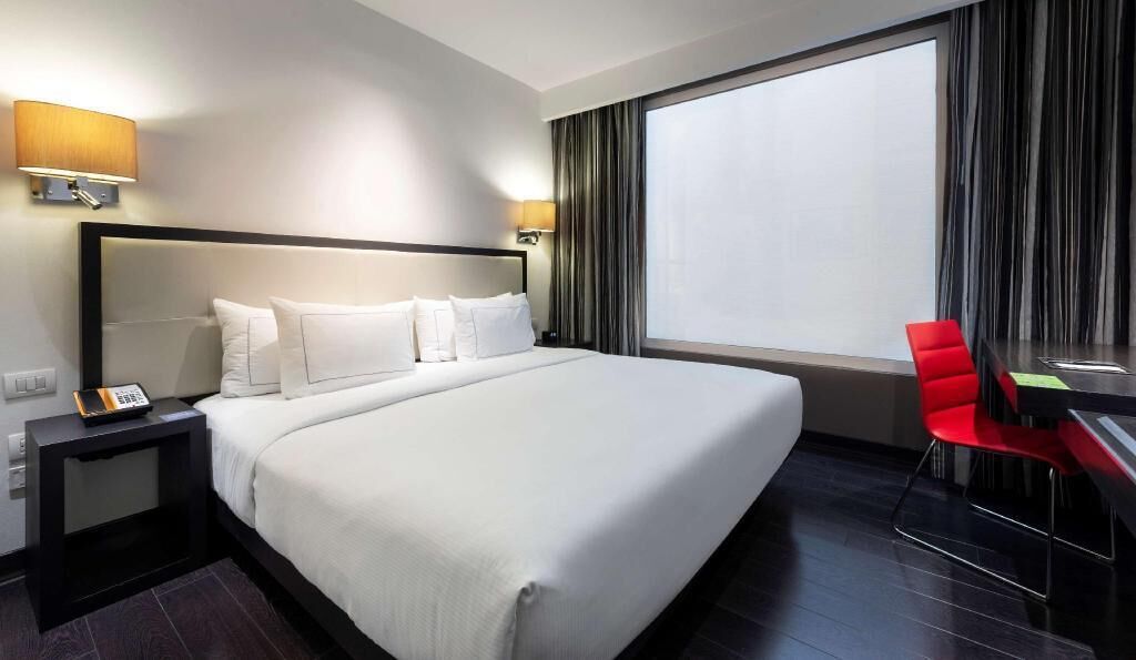 Ropa de cama de alta calidad, edredón, camas con pillow-top y minibar 