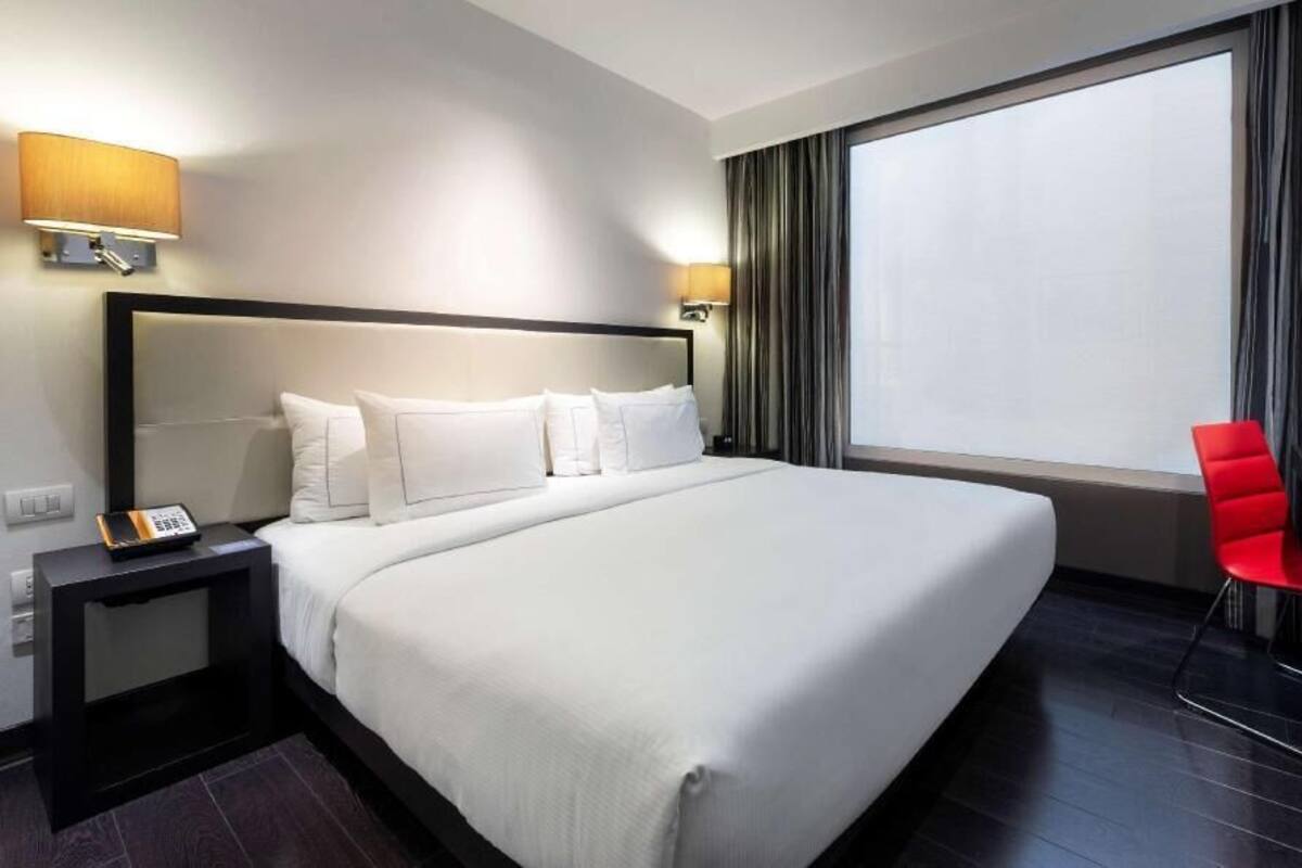 Ropa de cama de alta calidad, edredón, camas con pillow-top y minibar