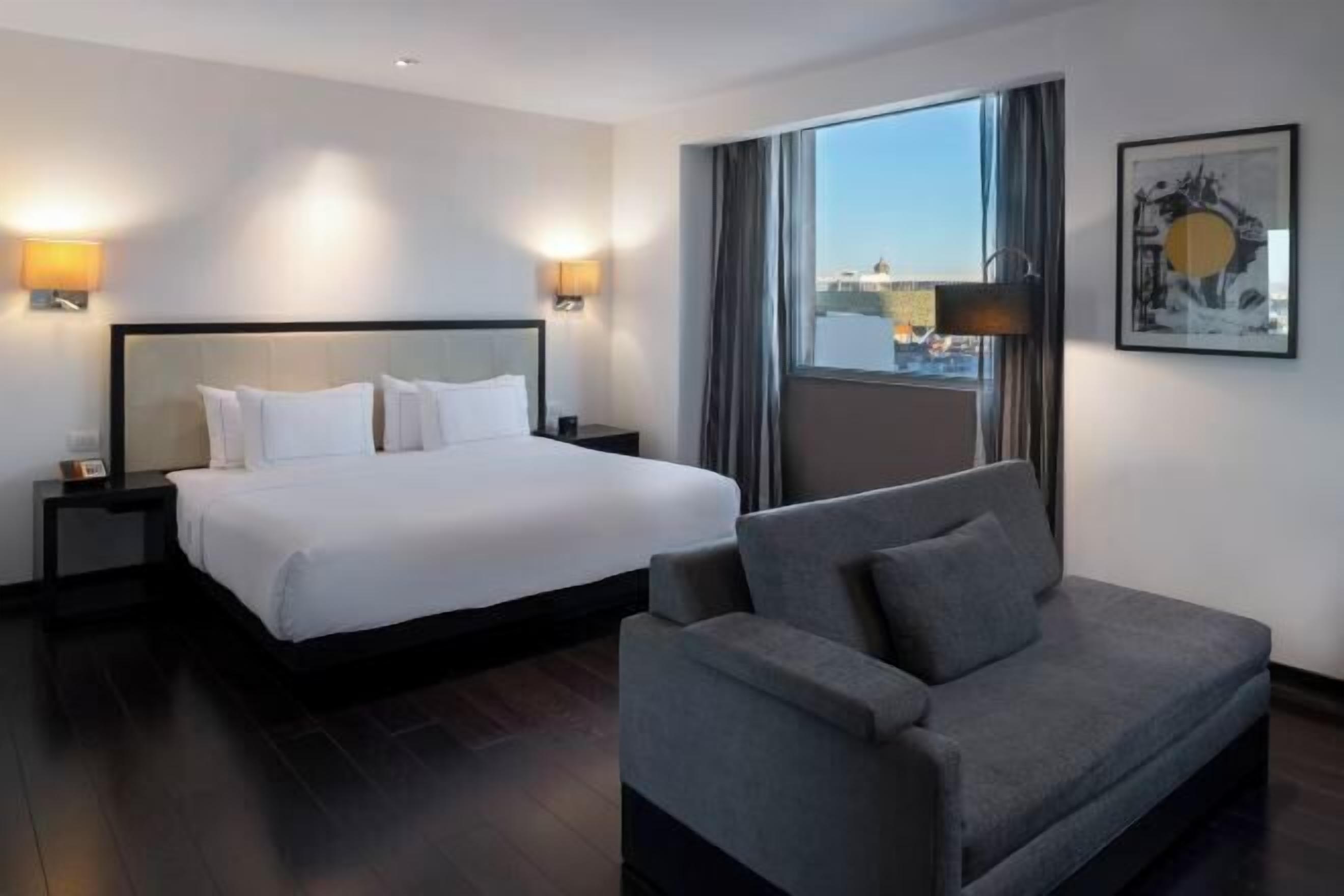 Premium bedding, down comforters, pillowtop beds, minibar