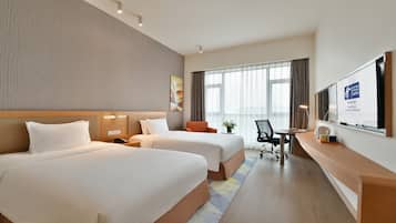 Down comforters, pillowtop beds, minibar, in-room safe