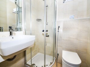 Shower, free toiletries, hair dryer, slippers