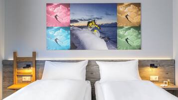 Premium bedding, memory-foam beds, desk, laptop workspace