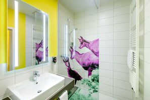 Shower, eco-friendly toiletries, hair dryer, towels