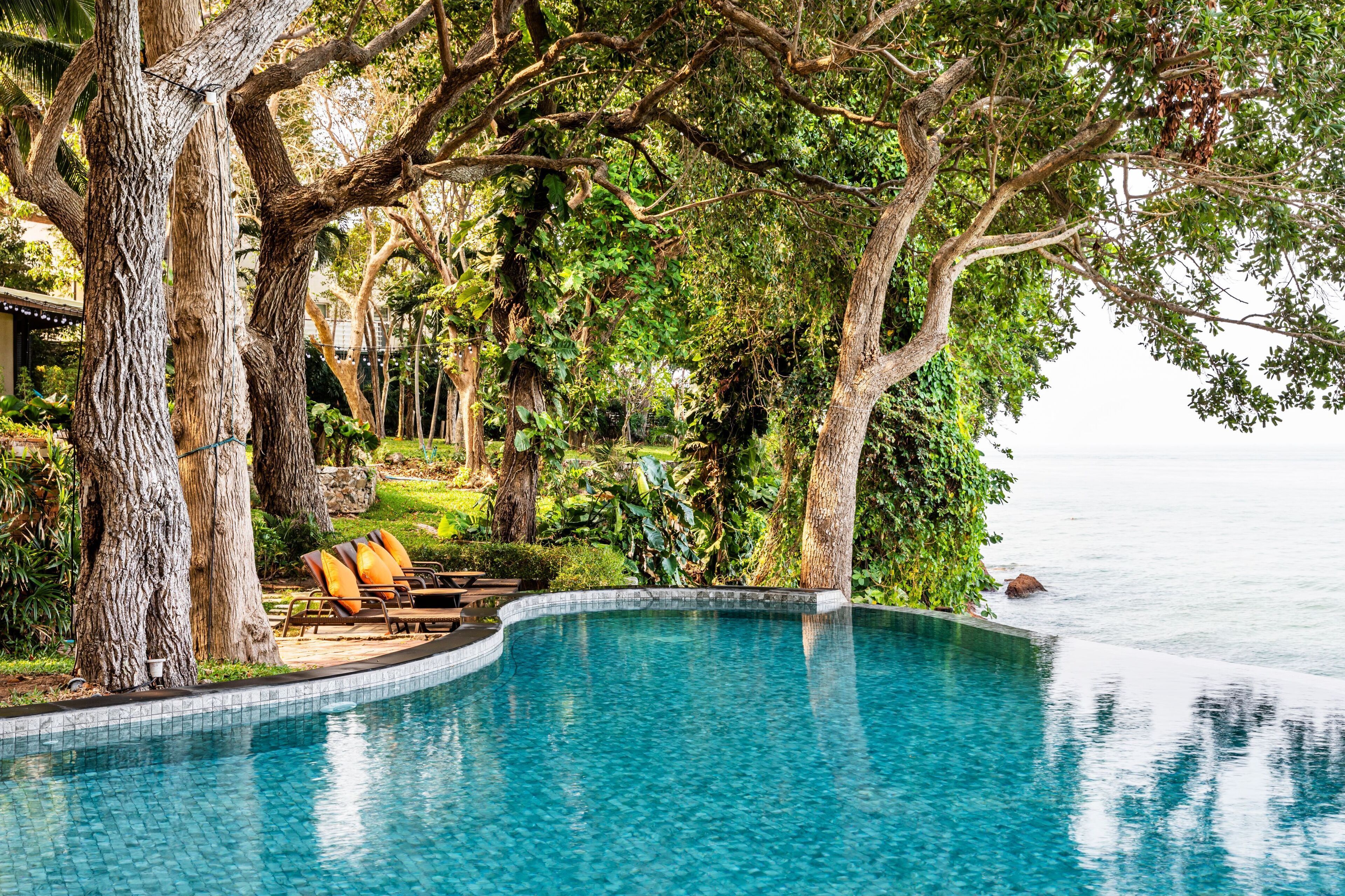 outdoor pool, pool umbrellas, pool loungers