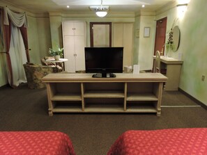 Luxury Suite, Jetted Tub | Premium bedding, in-room safe, desk, laptop workspace