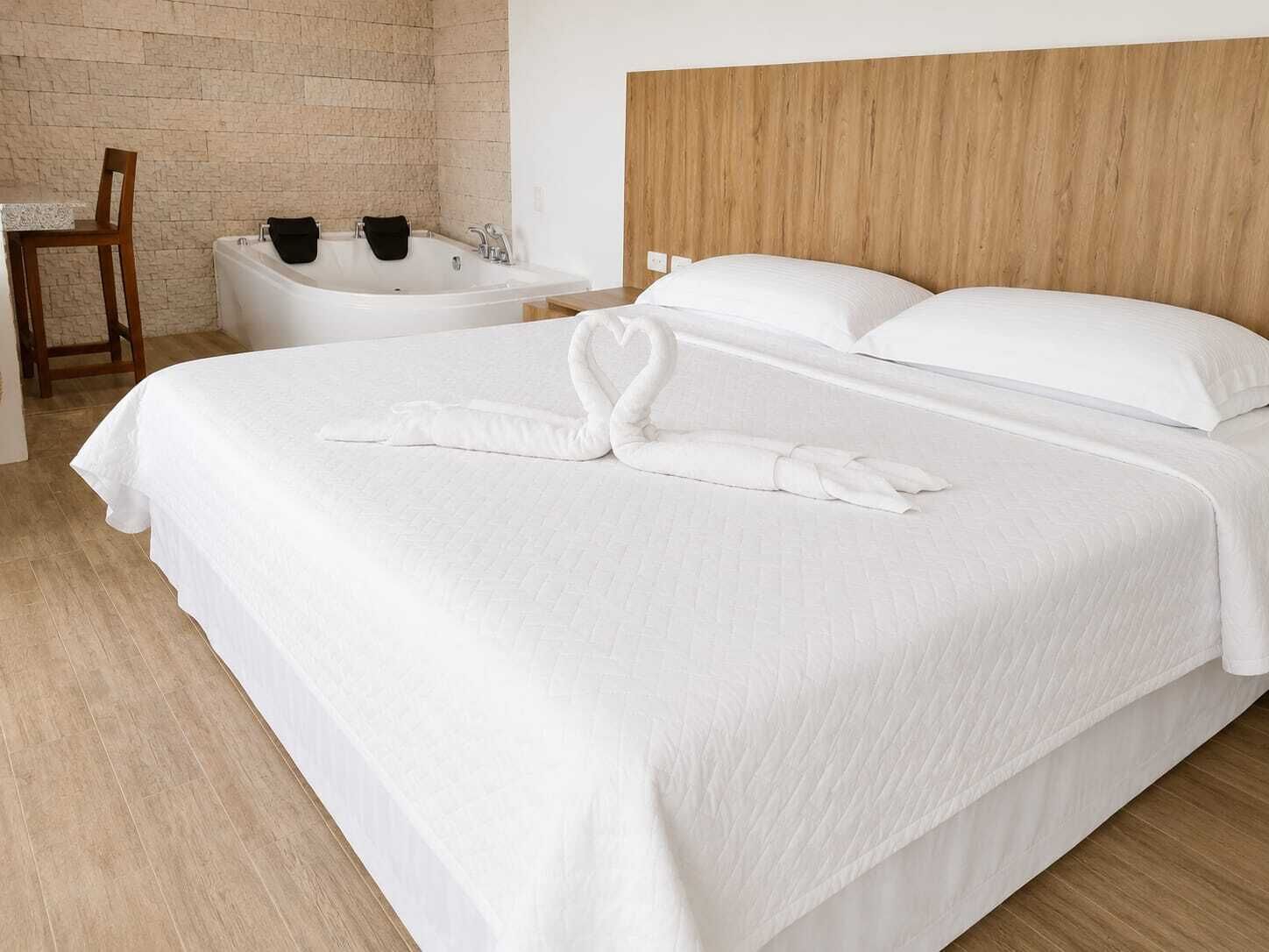 Junior Suite, 1 Bedroom | WiFi (free), bed sheets