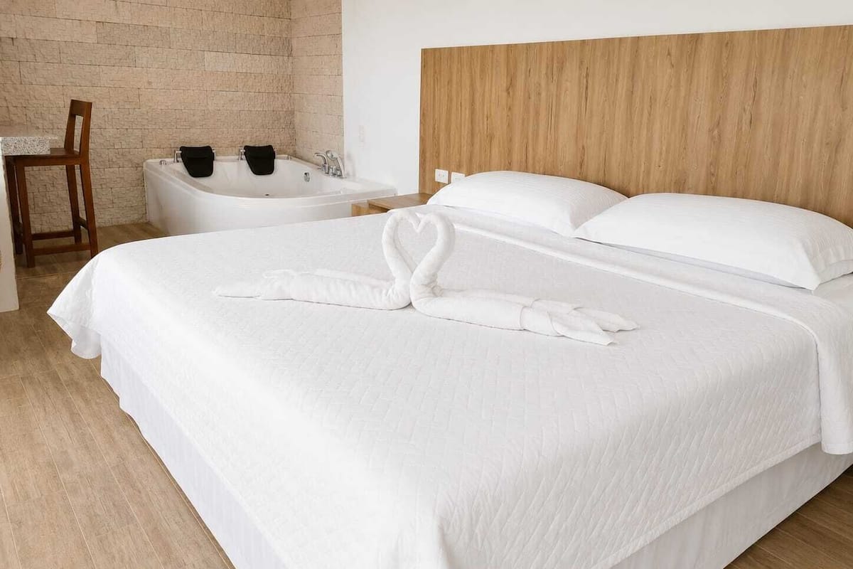 Junior Suite, 1 Bedroom | WiFi (free), bed sheets