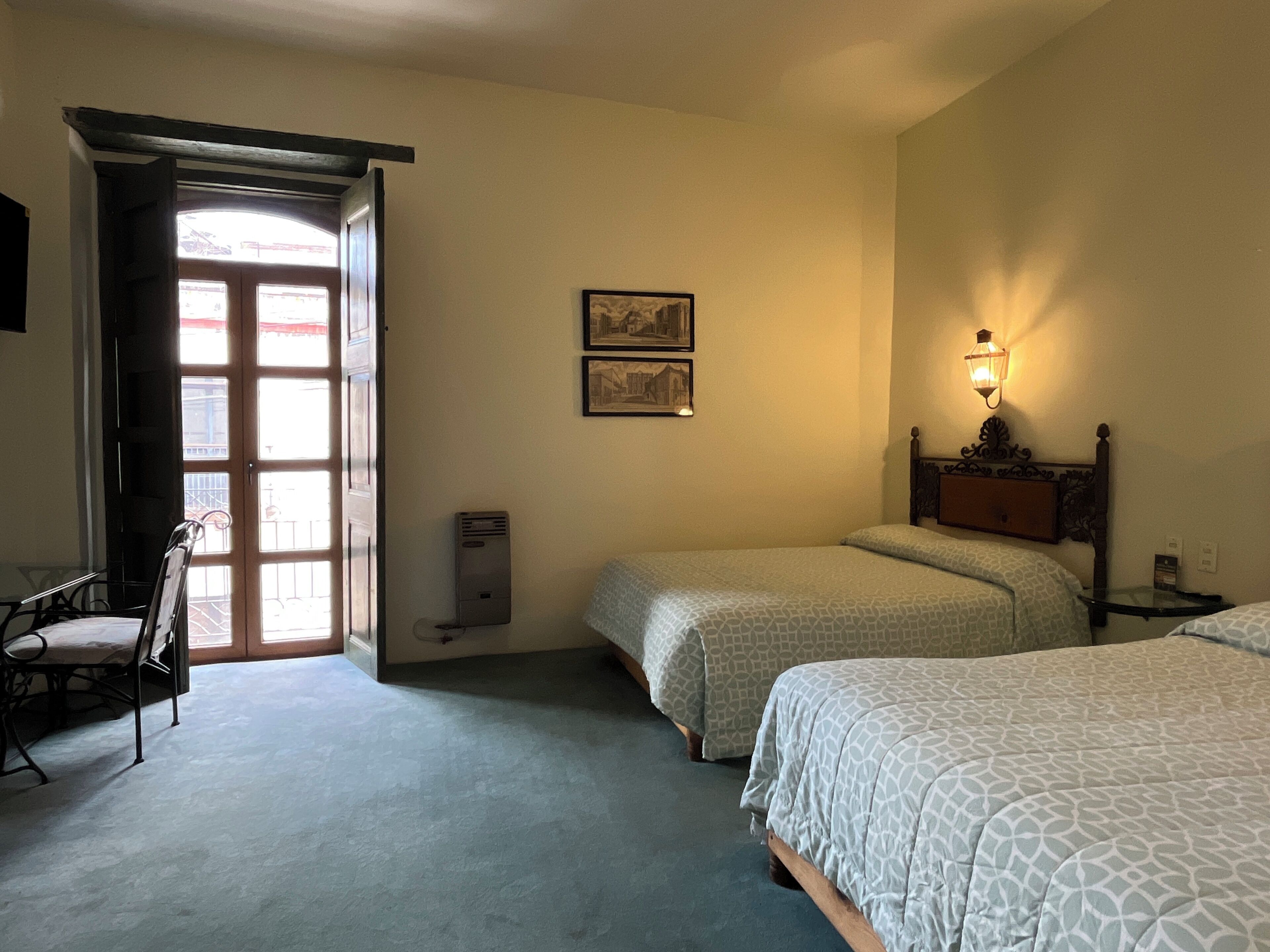 Double Room, City View | Iron/ironing board (on request), WiFi (free), individually decorated