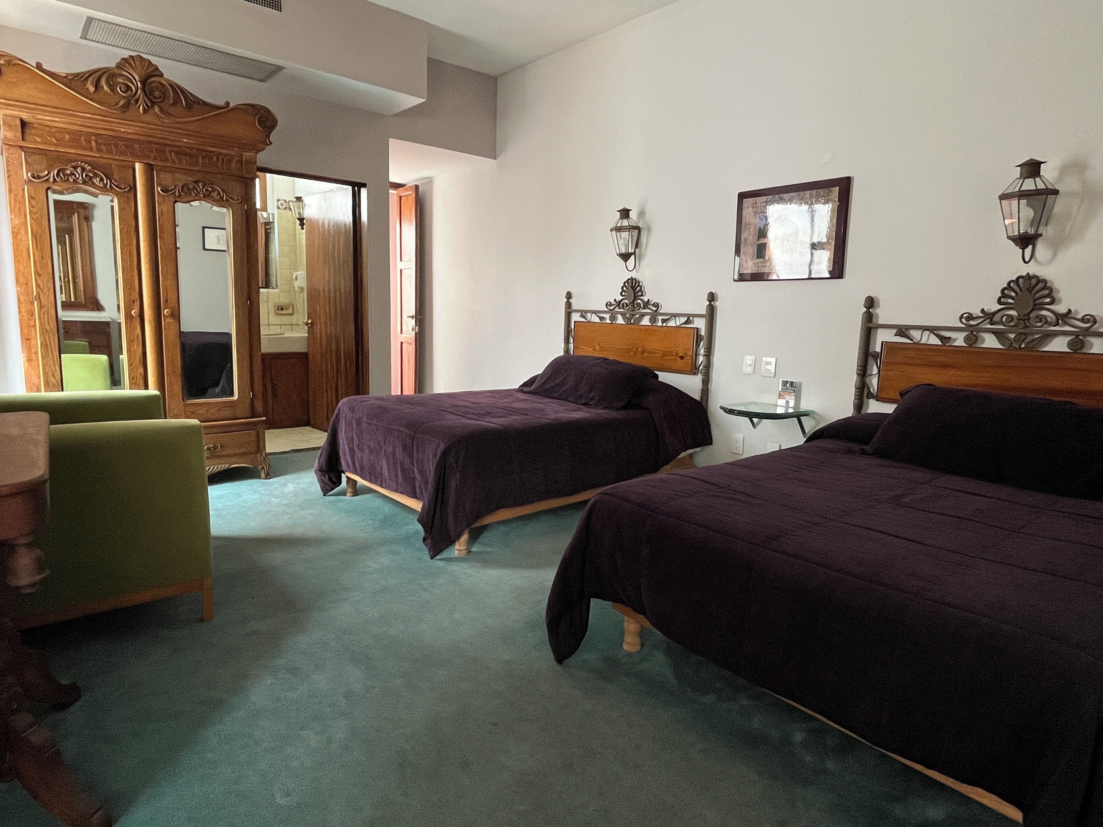 Suite, 2 Bedrooms | Iron/ironing board (on request), WiFi (free), individually decorated