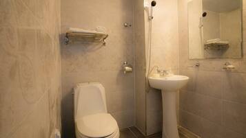 Shower, free toiletries, hair dryer, slippers