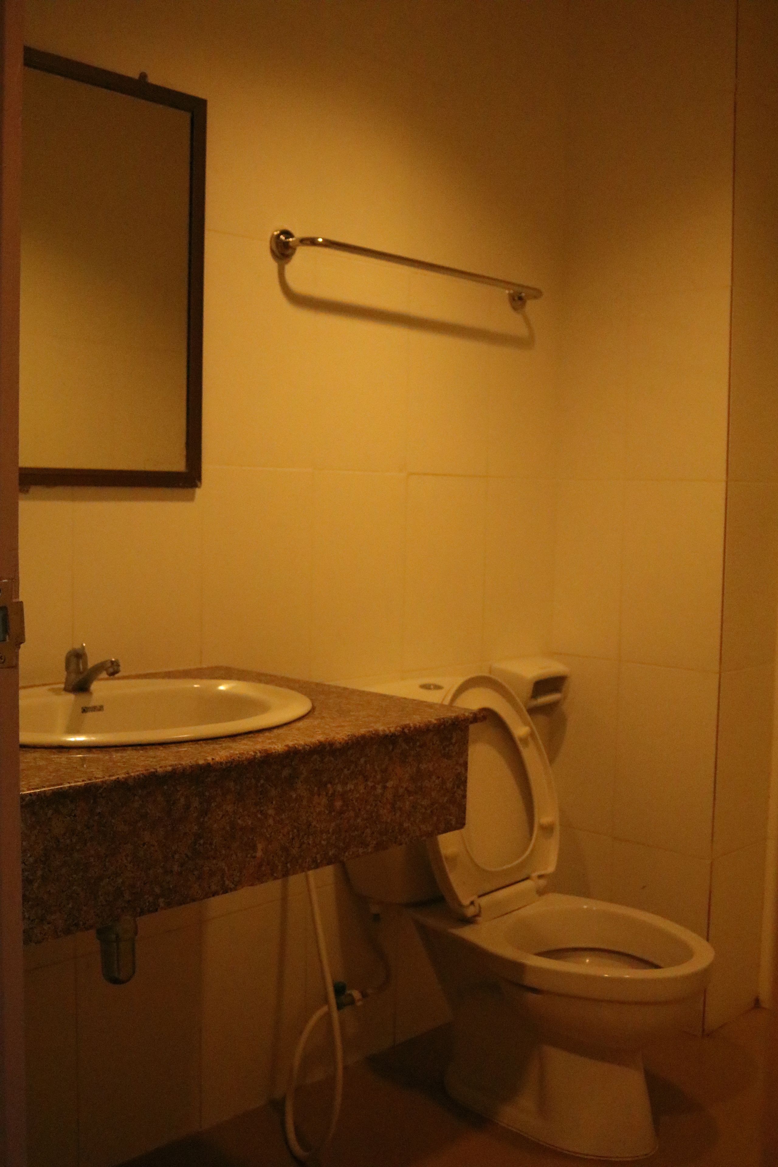 standard triple bed | bathroom | free toiletries, towels