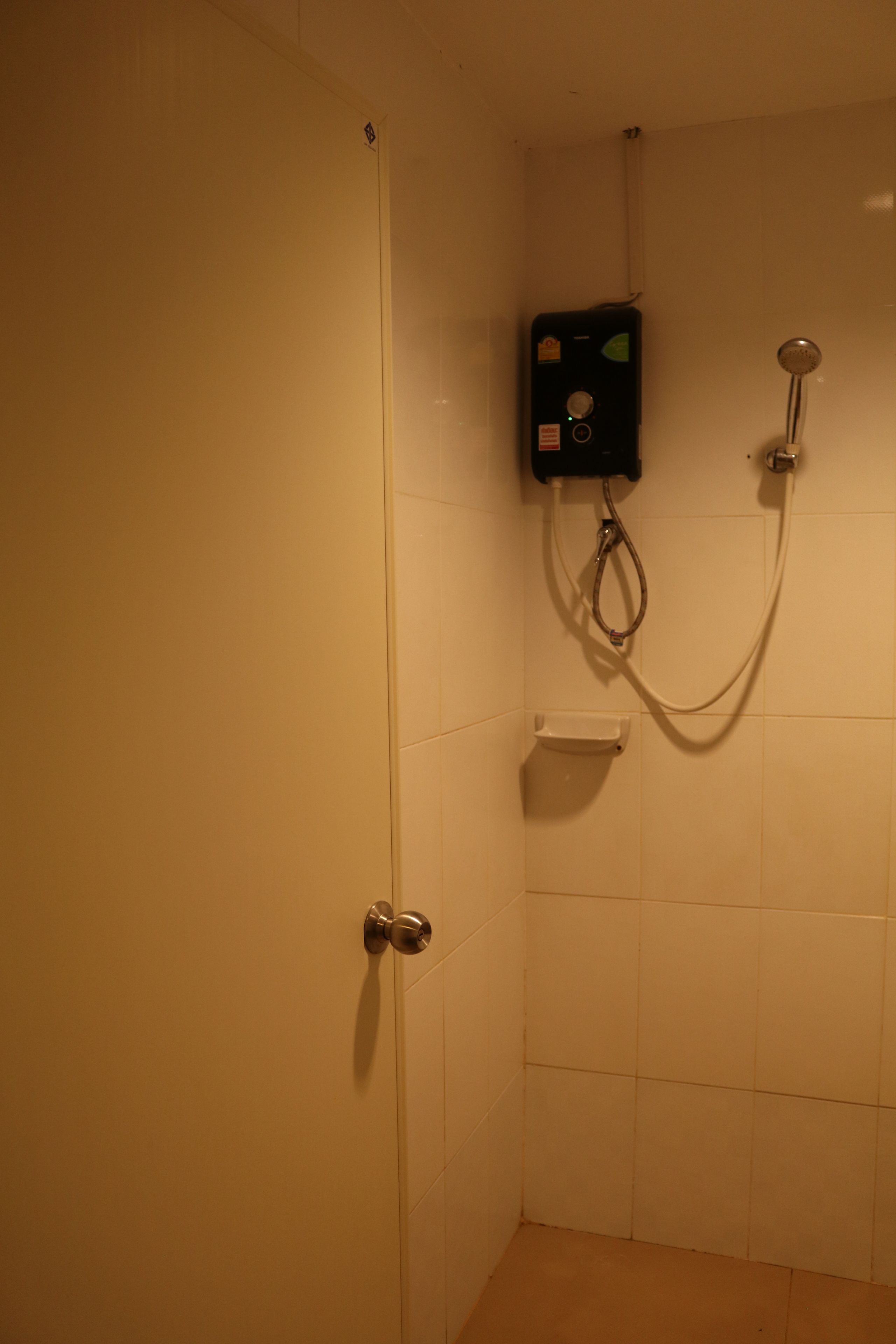 standard twin bed | bathroom | free toiletries, towels