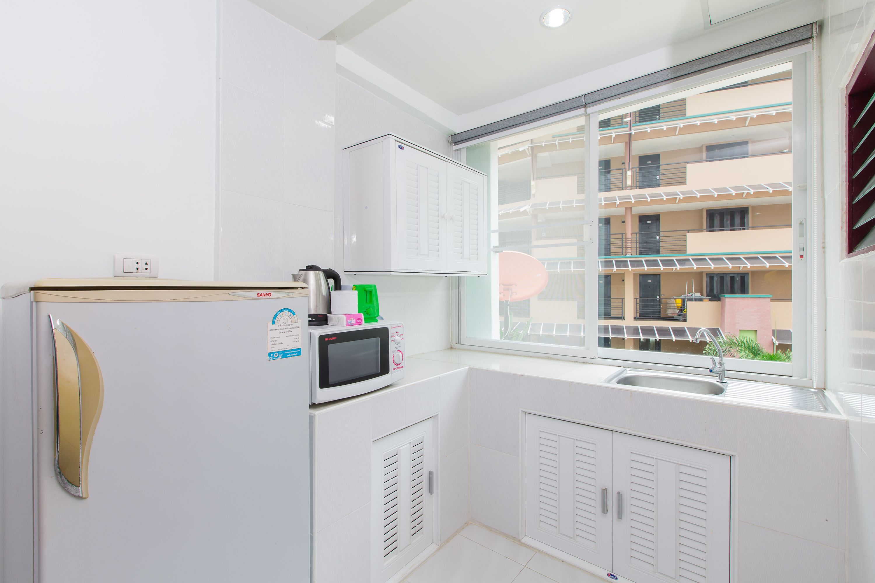 Fridge, microwave, electric kettle, rice cooker