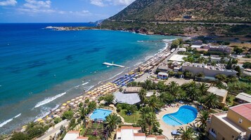 Private beach, sun loungers, beach towels, beach bar