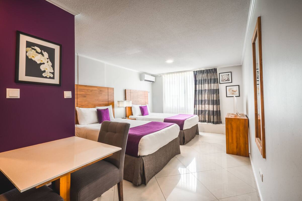 signature suite, 2 double beds, kitchenette | 1 bedroom, in-room safe, desk, iron/ironing board