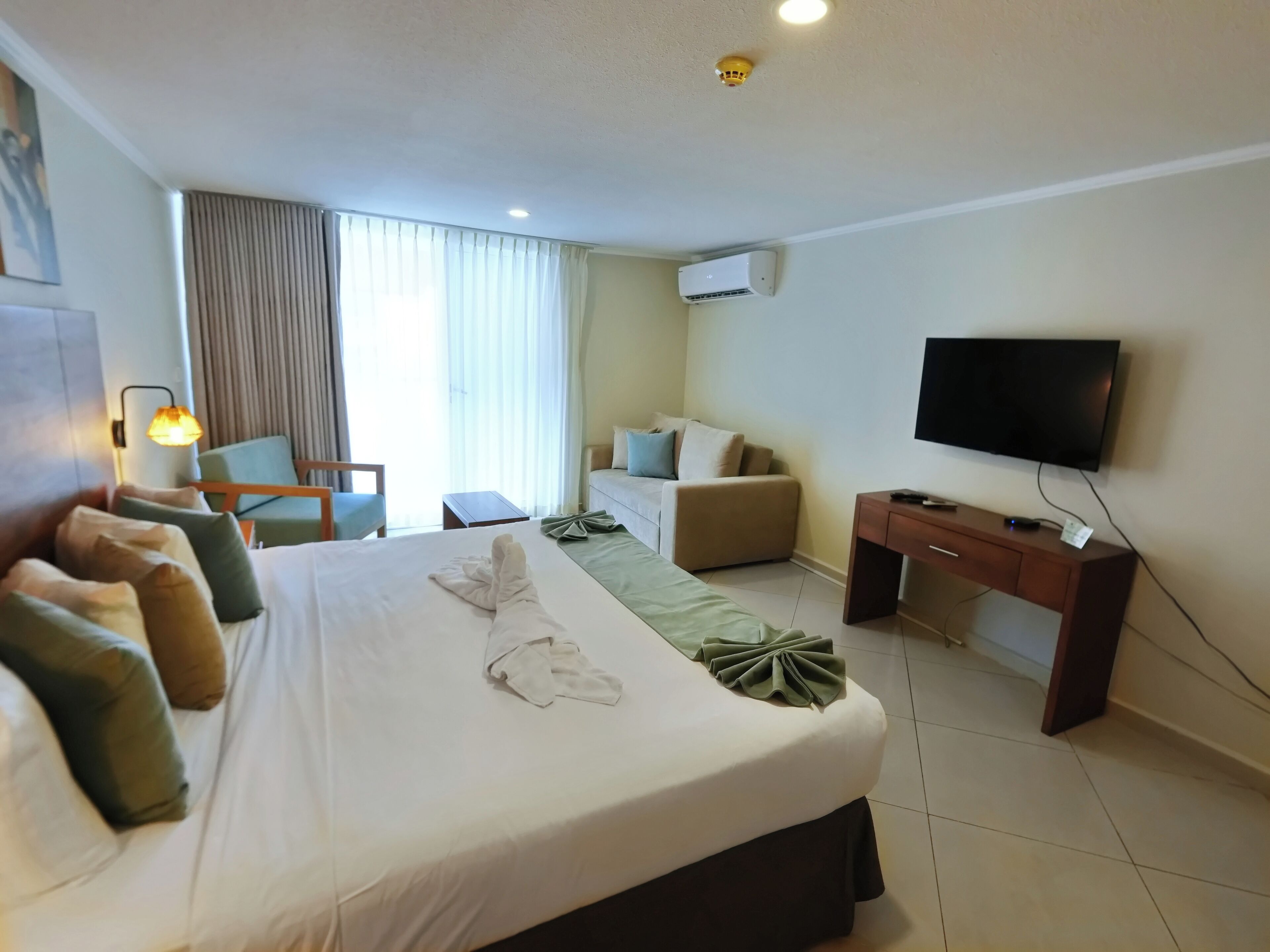signature suite, 1 king bed, kitchenette | 1 bedroom, in-room safe, desk, iron/ironing board