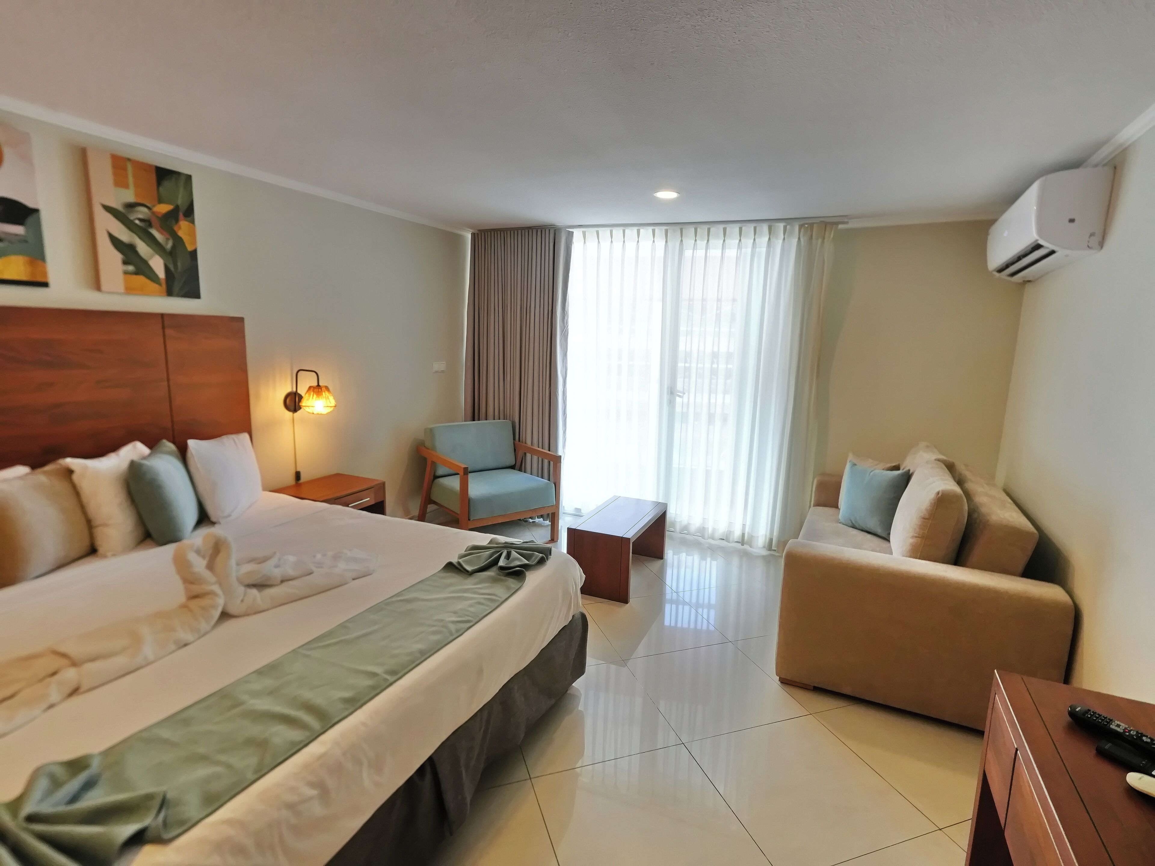 signature suite, 1 king bed, kitchenette | 1 bedroom, in-room safe, desk, iron/ironing board
