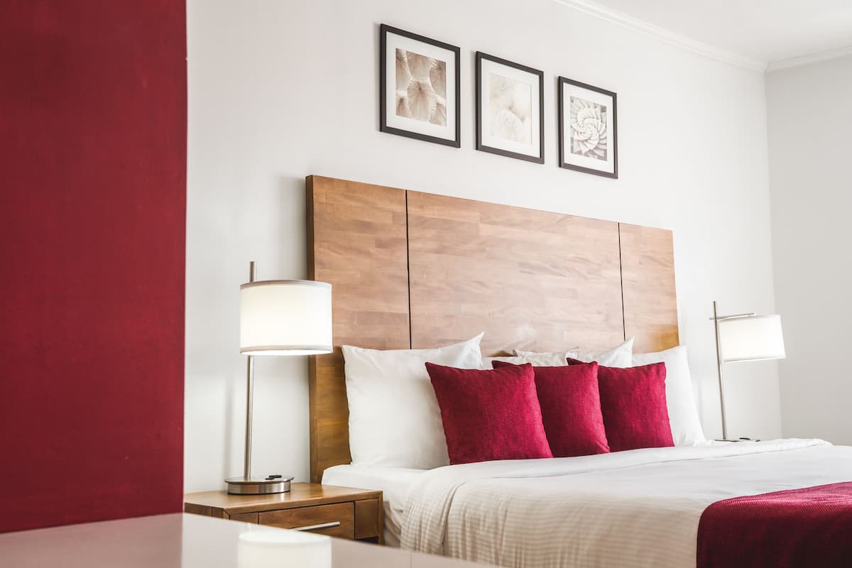 Signature Suite, 1 King Bed, Kitchenette, City View | 1 bedroom, in-room safe, desk, iron/ironing board