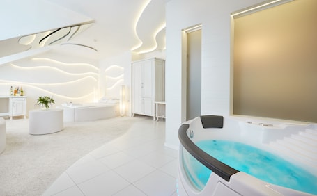 Apartment Boutique | Living area | Flat-screen TV, toys