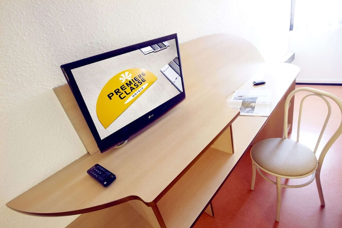 Luxe beddengoed, een bureau, gratis wifi, beddengoed