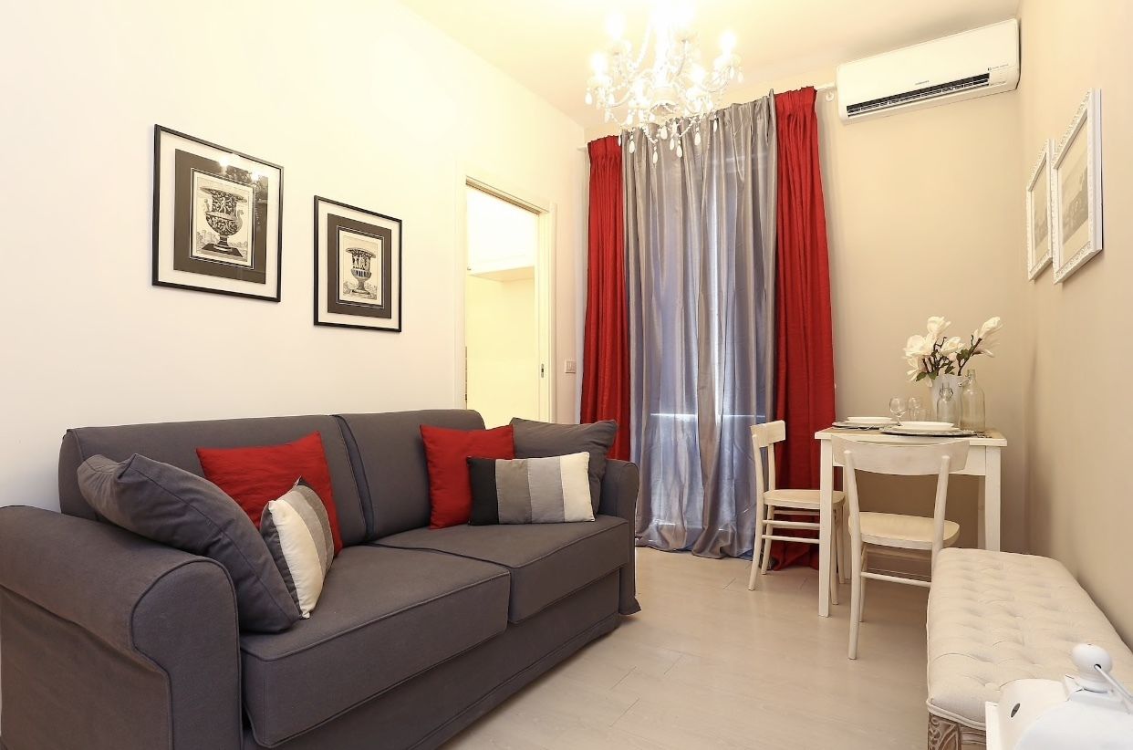 Superior-íbúð | Stofa | 32-tommu flatskjársjónvarp með stafrænum rásum, sjónvarp.