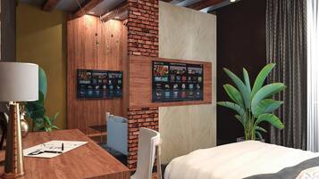 Kamar Quadruple (Suite) | Bantalan ekstra lembut, minibar, brankas, dan meja kerja