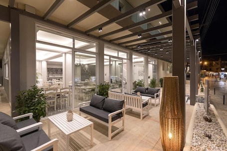 Outdoor dining. Kassiopi Oasis Hotel