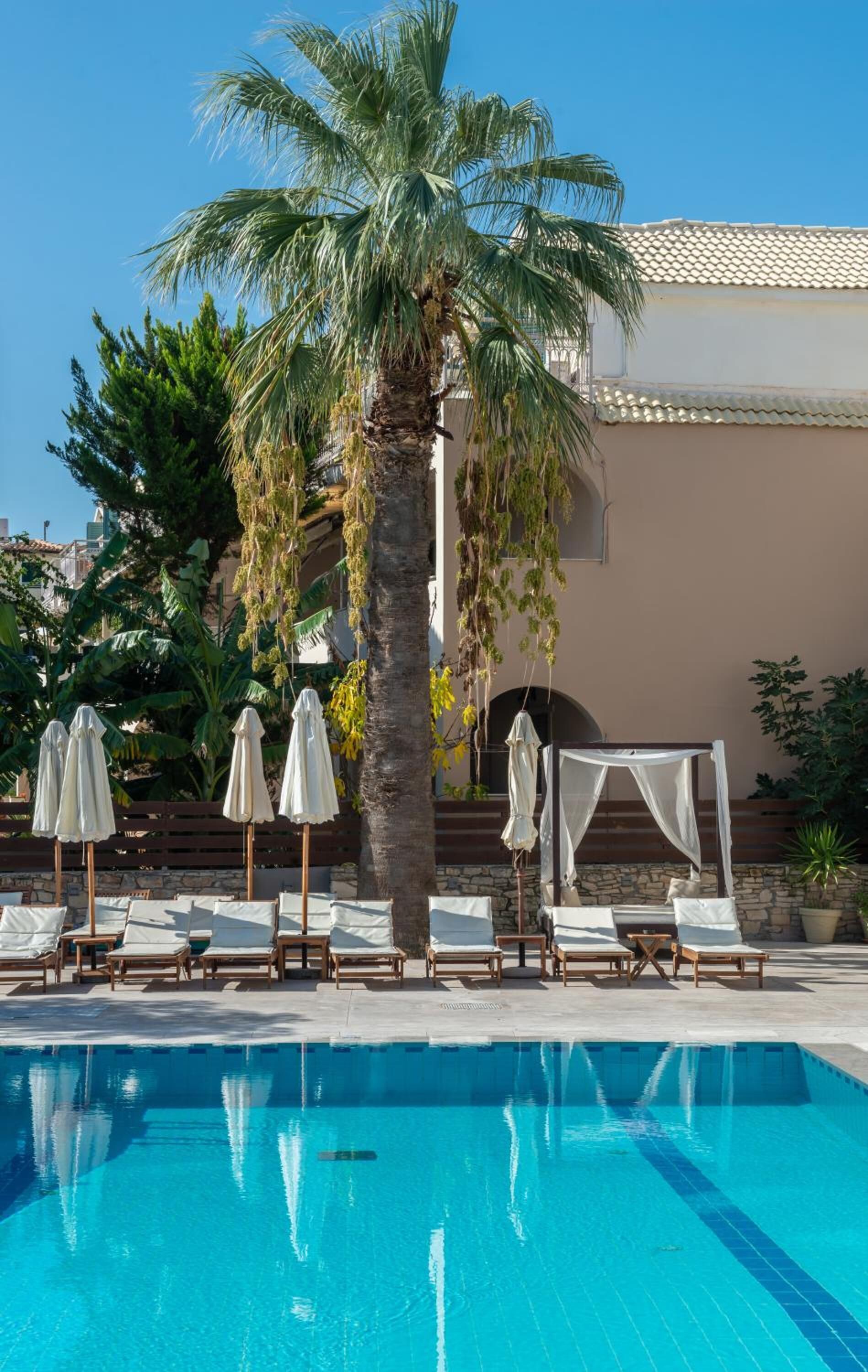 outdoor pool, pool umbrellas, pool loungers