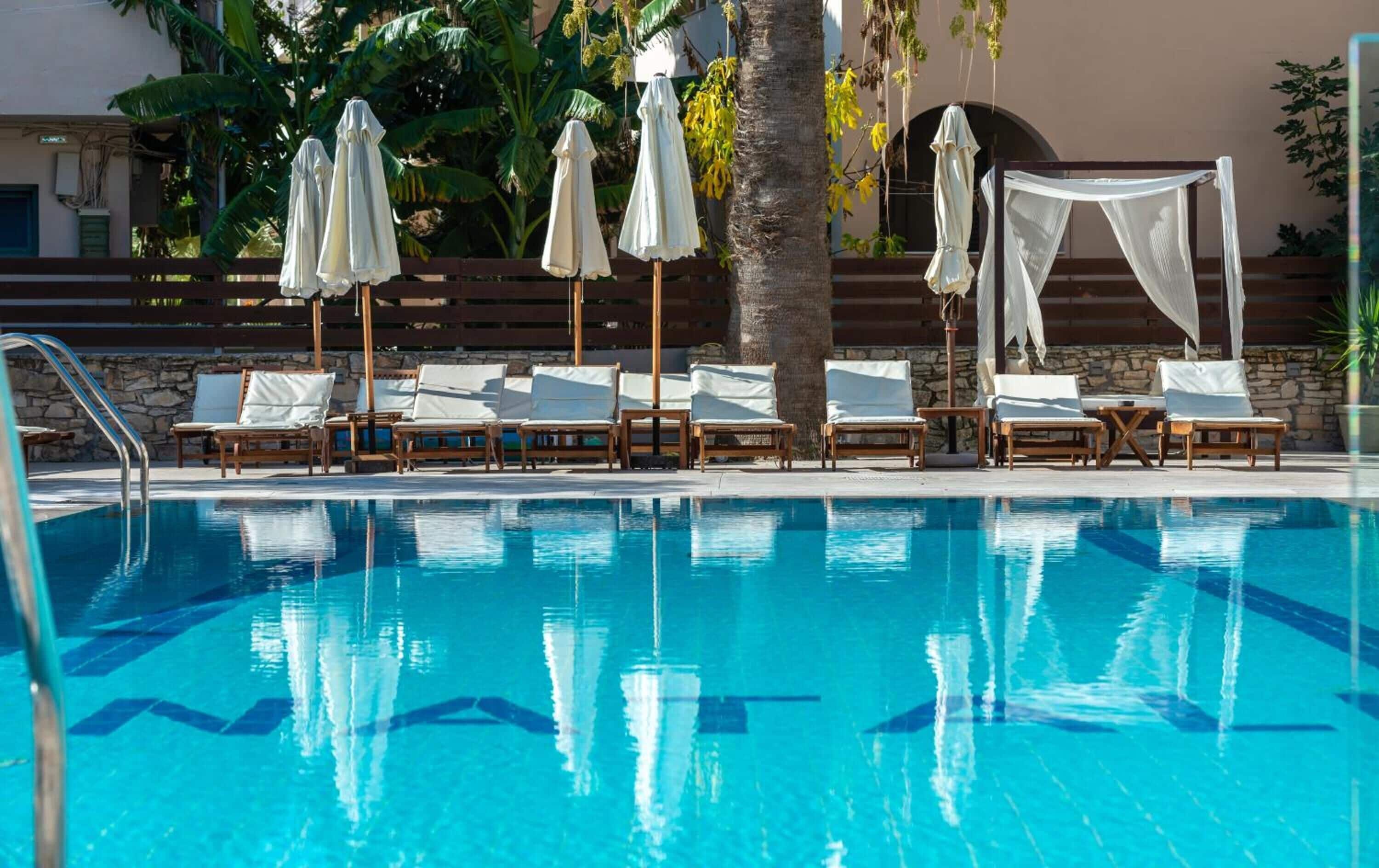 outdoor pool, pool umbrellas, pool loungers